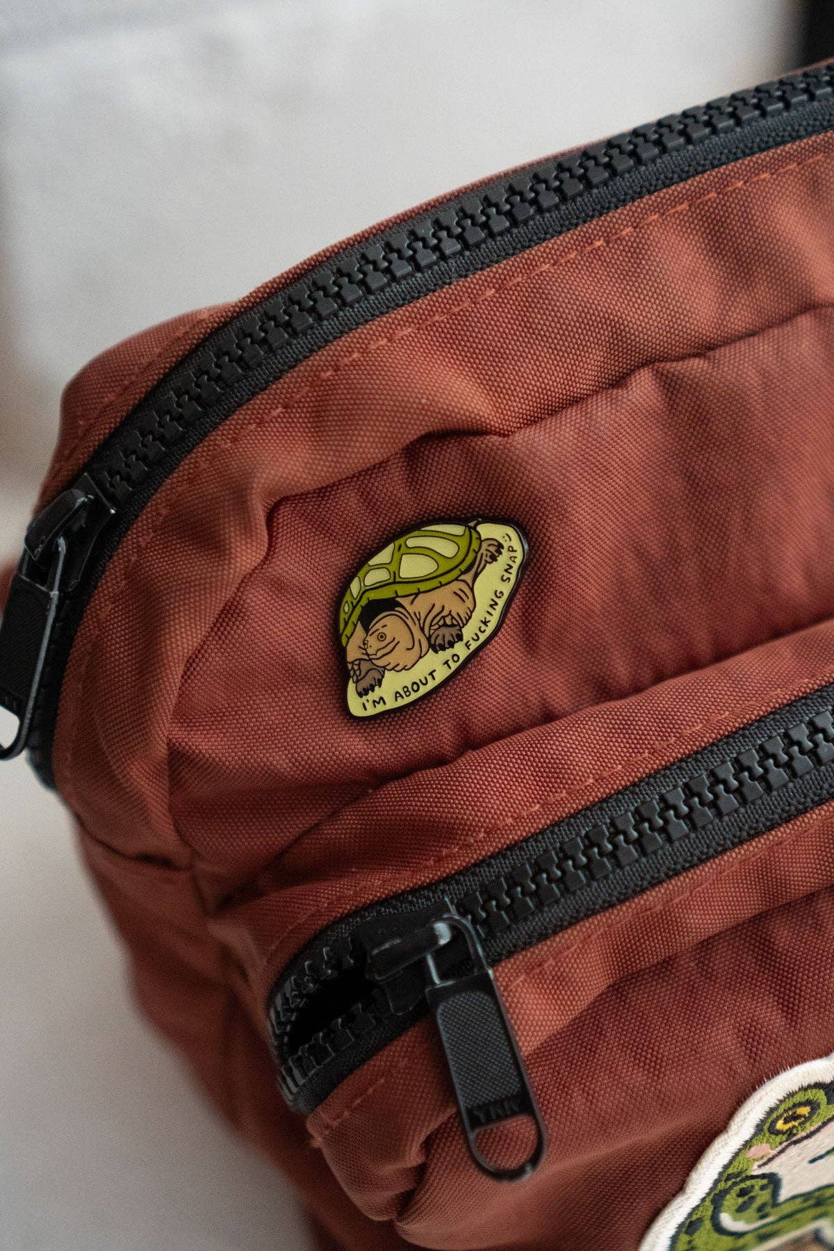About To Snap Enamel Pin