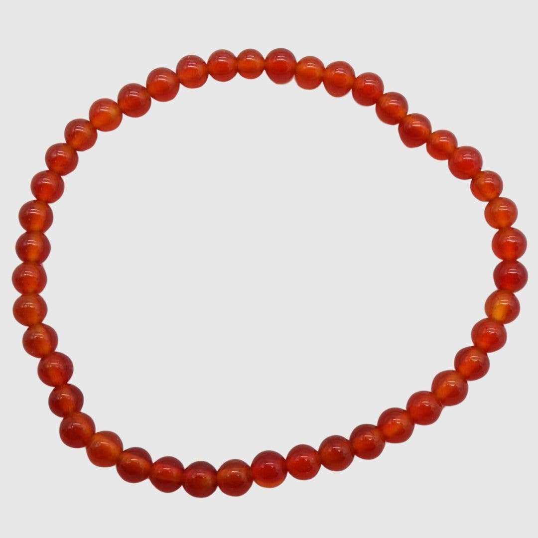 Carnelian bead bracelet with 5mm round orange stones on elasticated band