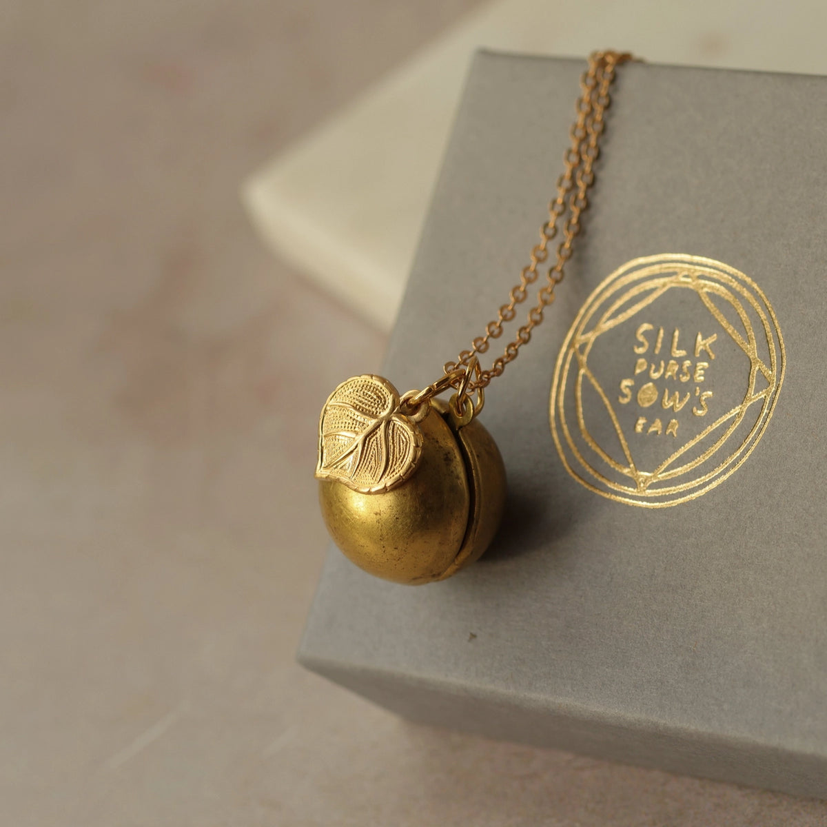 Vintage Sphere Locket with Leaf Charm