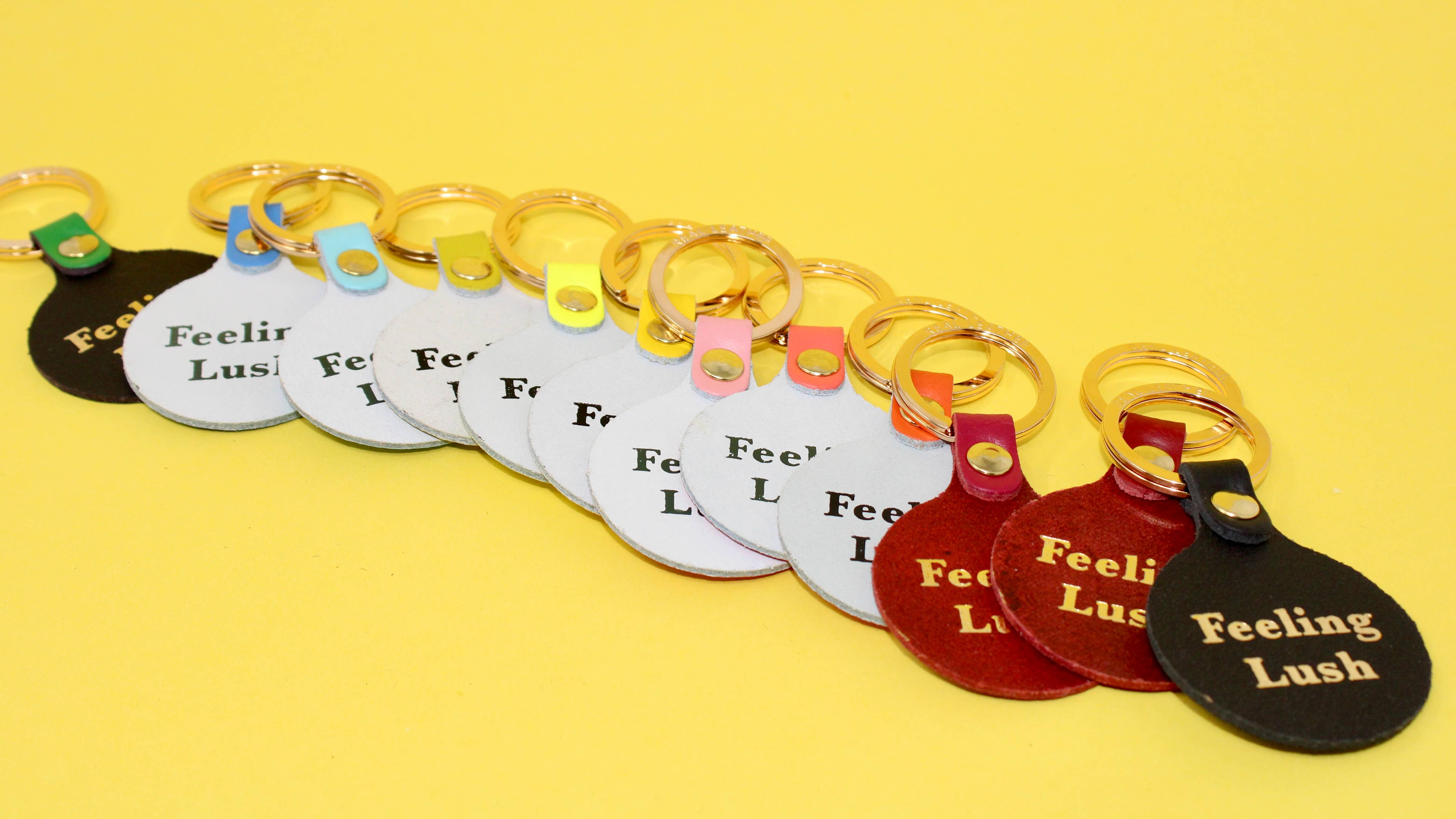 Feeling Lush Smilie Face Key Fob - Coral